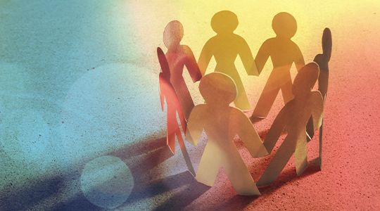 Paper cutout figures holding hands in a circle, symbolizing community, connection, and mutual support